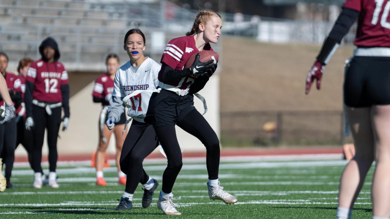 High School Girl Runs over Opponent in Game of Flag Football Game